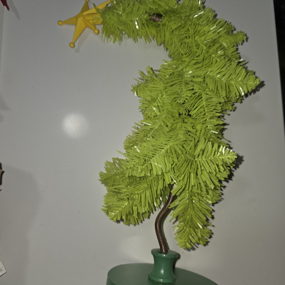 Festive Green Holiday Tree with Star Topper